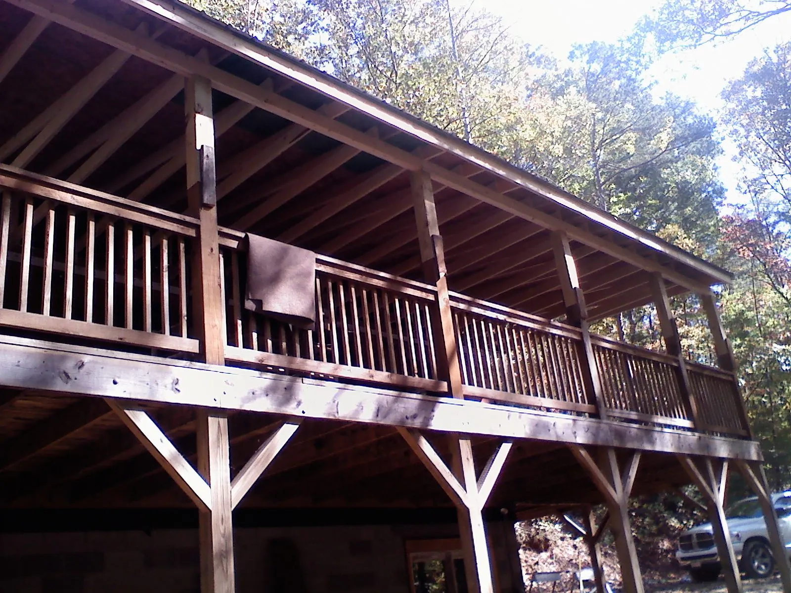 Timber framing under a new elevated porch and deck — Roof Leak Repair in Clearwater by Roofing Brothers